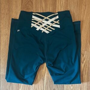 Fabletics Dark Teal Leggings with White Cross Design